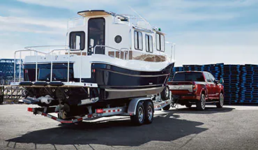 2022 Nissan TITAN Truck towing boat | Nissan City of Port Chester in Port Chester NY